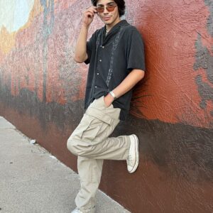 18-year old Leon Carrasco leaning against a wall